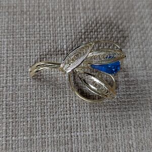 Elegant Gold and Blue Brooch
